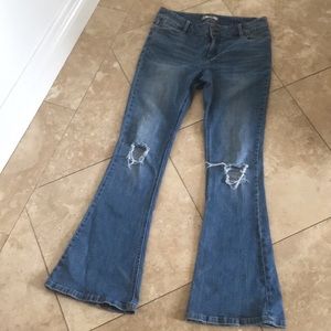 Free People distressed knee high rise flare jeans